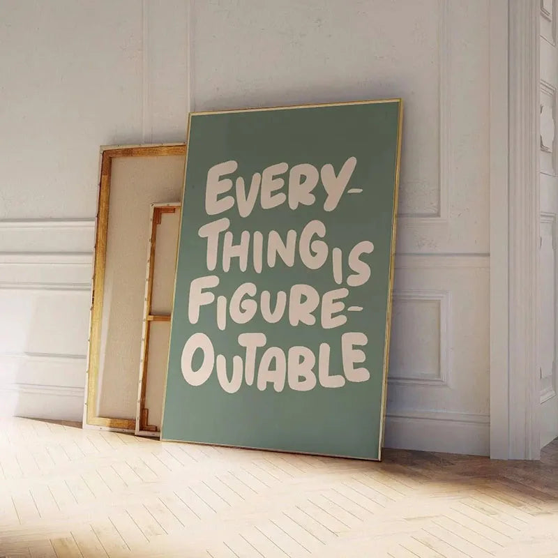 A vertical canvas print featuring the quote Every Thing Is Figure-Outable in white text on a muted green background.