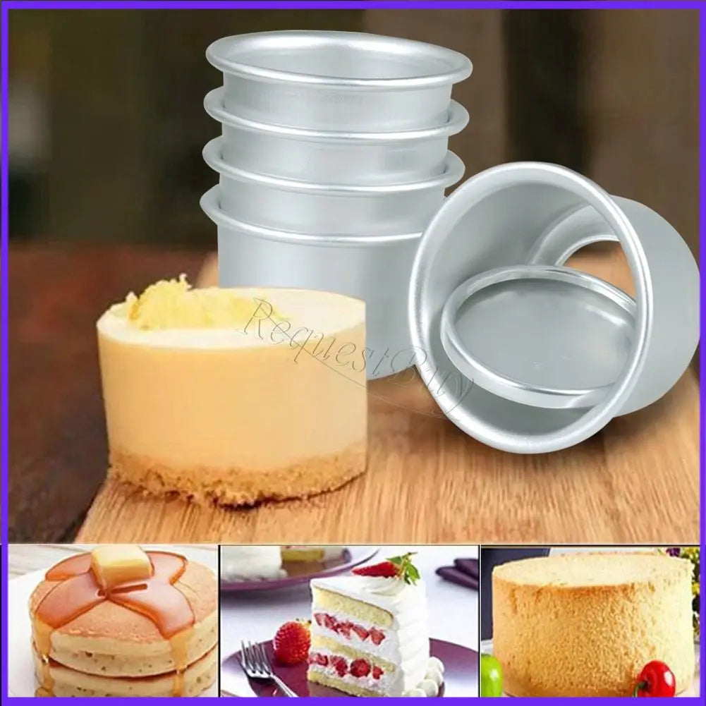 A set of five silver non-stick round cake molds stacked, alongside a finished light yellow cheesecake.