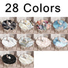A collection of 28 marble print waterproof round tablecloths in various colors and patterns.