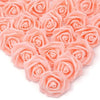 A close-up view of pink artificial foam rose decorations arranged in a cluster.