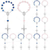 Assorted mini baptism rosary favors with cross necklaces featuring blue and pink beads.