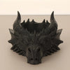 Sculpture de tête de dragon gothique noir pour bureau avec des cornes acérées et des détails faciaux.