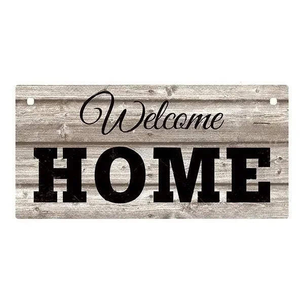 Rustic wooden hanging sign with the words Welcome Home carved into the wood.