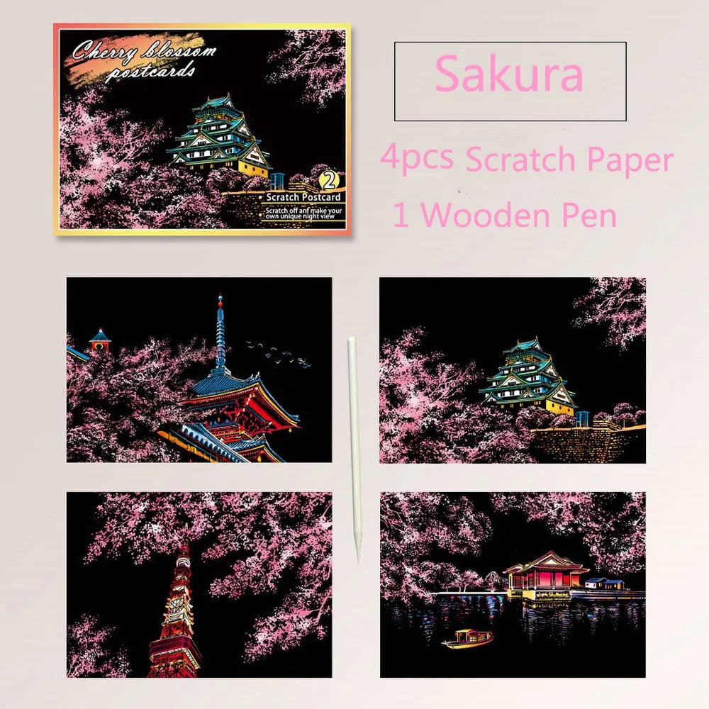 A set of four scratch paper cards featuring cherry blossom scenes and a wooden pen for DIY painting art kit