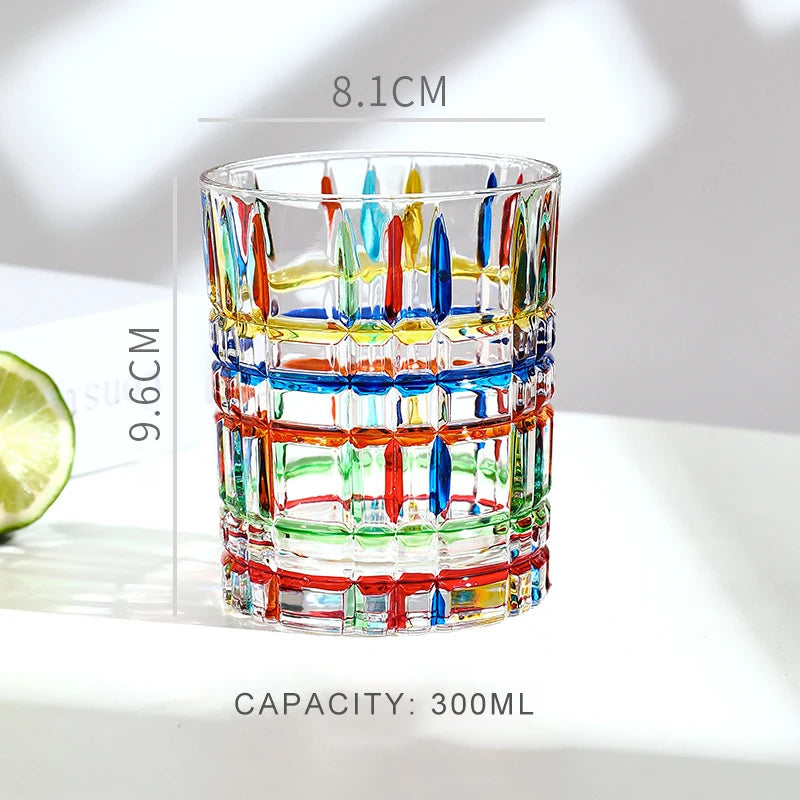 A stack of faceted crystal whiskey glasses with multicolored designs and a 300ml capacity.
