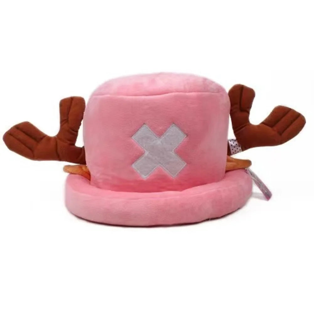 Pink plush knit cap resembling a character's head with brown ears and a silver cross detail