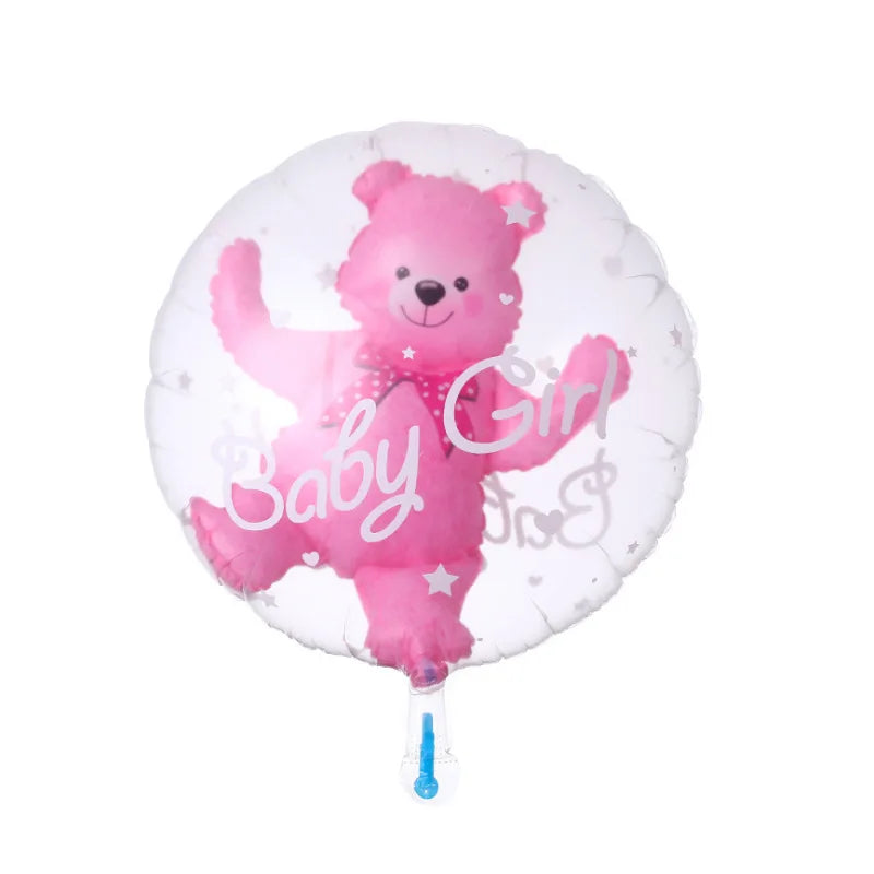 A pink bubble balloon shaped like a teddy bear with a heart design for a baby shower or birthday party.