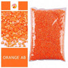 Bag of orange resin rhinestones flatback with varying sizes