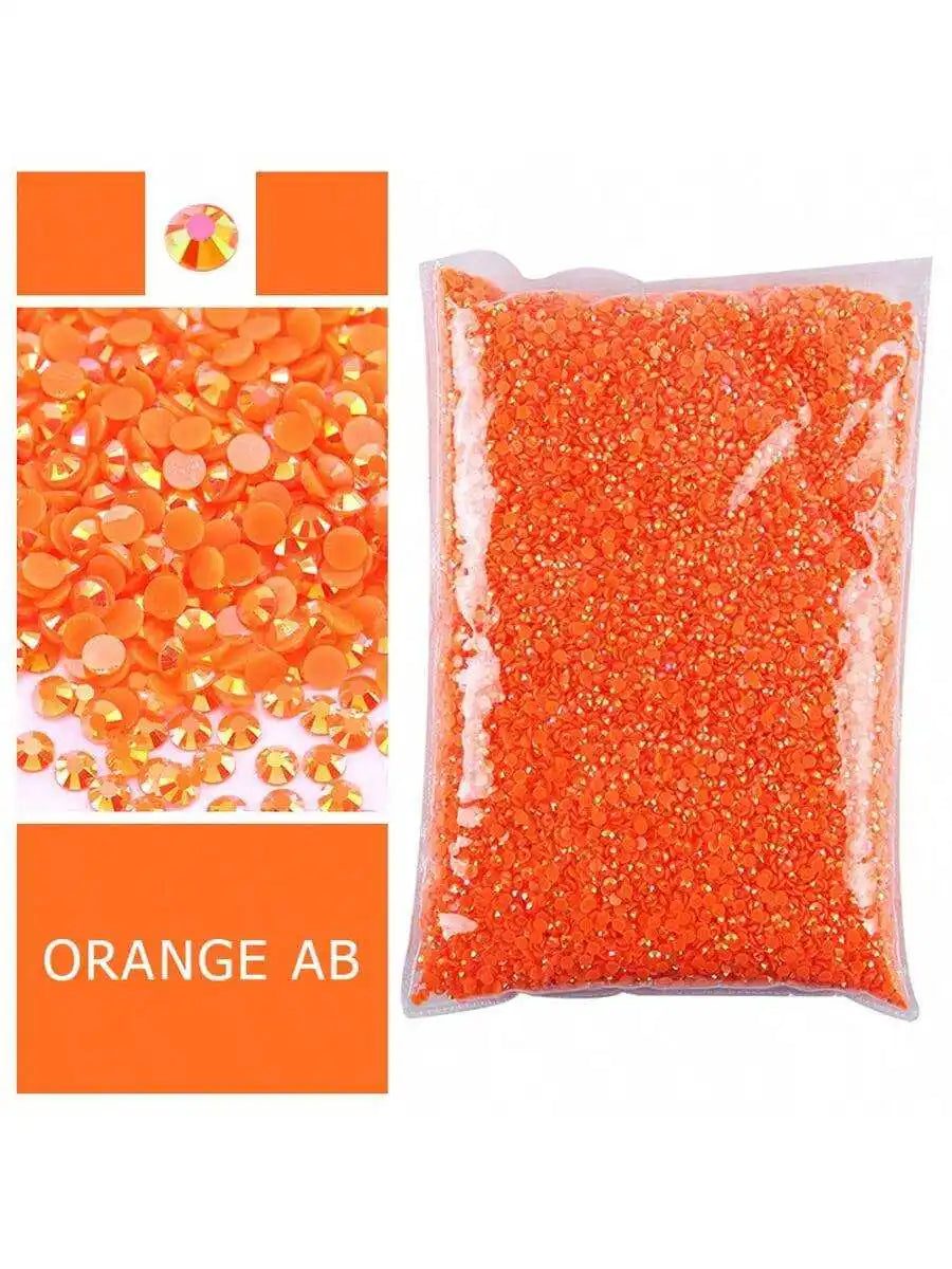 Bag of orange resin rhinestones flatback with varying sizes
