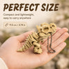 A hand holds a small, light beige 3D printed T-Rex skeleton model with articulated joints.