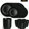 A set of 32 black reusable plastic tableware items including plates and cups.