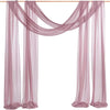 Elegant mauve chiffon drapes hanging in an arch style for weddings and events