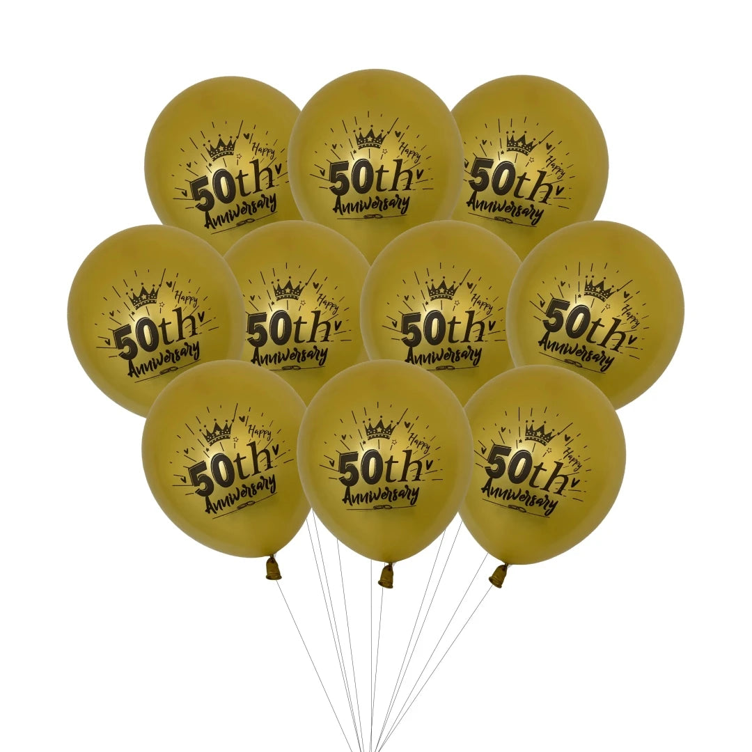 A bunch of yellow latex confetti balloons with gold lettering celebrating a 50th anniversary.