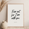 A framed canvas print featuring the Bible verse Fear not for I am with you in elegant black script on a light background.