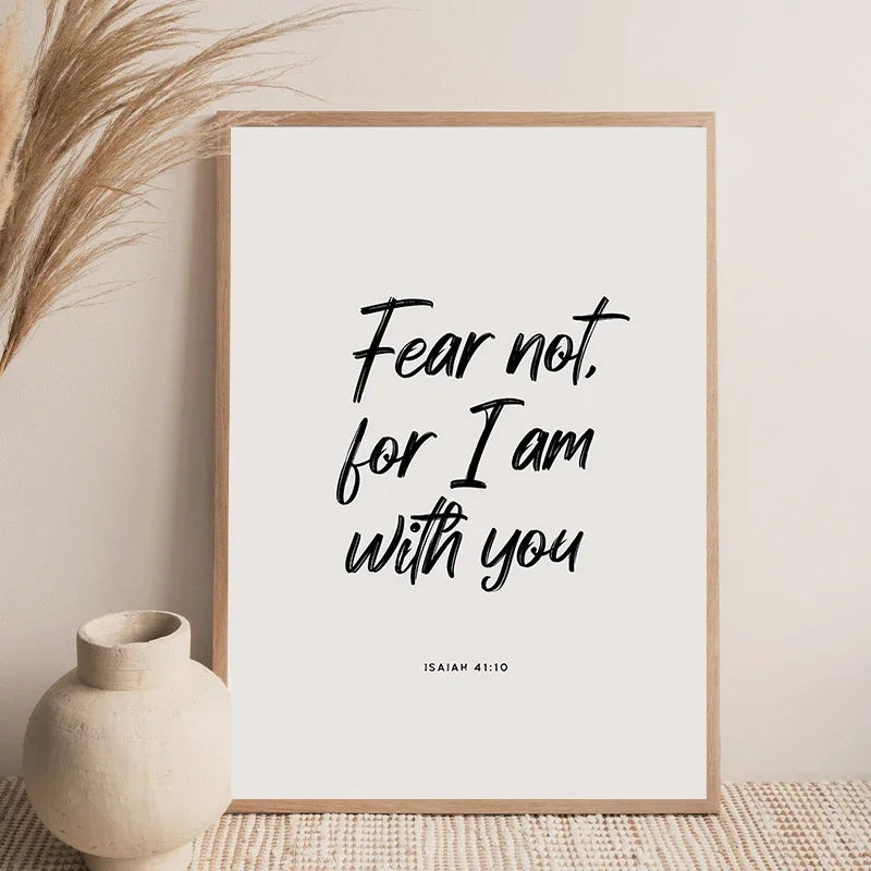 A framed canvas print featuring the Bible verse Fear not for I am with you in elegant black script on a light background.