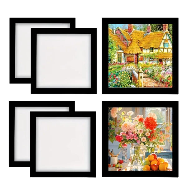 A set of four black magnetic diamond painting frames displaying various colorful artwork.