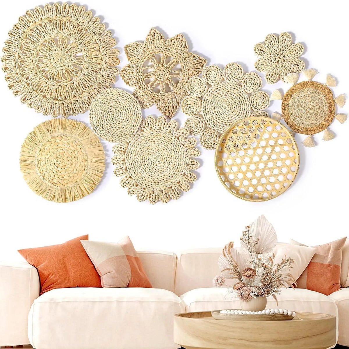 Boho straw wall hanging featuring woven textures and tassels displayed on a white wall.