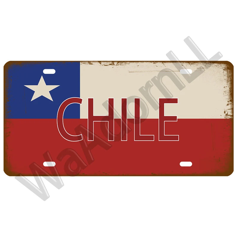 A vintage metal tin sign featuring the flag of Chile with a star and the word CHILE on a distressed background.