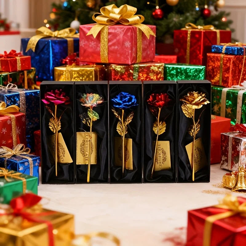 A collection of metallic foil rose flower gift sets in various colors and packaging displayed in a festive holiday setting.