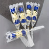 A bouquet of artificial rose soap featuring yellow and blue bear-shaped soaps wrapped in clear plastic.