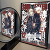A framed poster of the Soul Eater anime featuring two characters in dark clothing and a white-haired character.