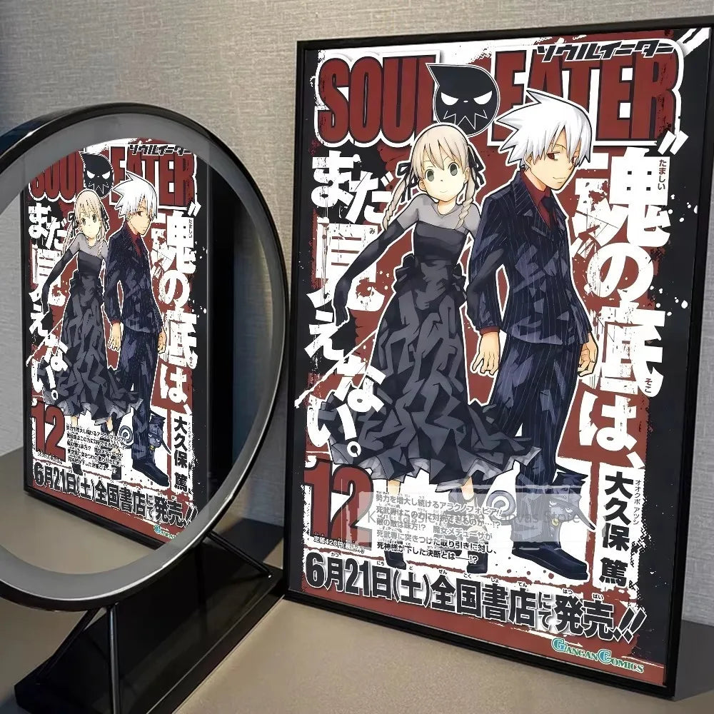A framed poster of the Soul Eater anime featuring two characters in dark clothing and a white-haired character.