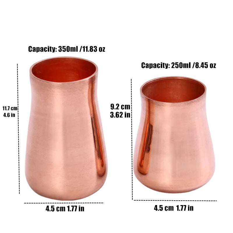 A handcrafted pure copper vintage mug with a matte rose gold finish, shown from the side.