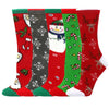A stack of five Christmas women's socks featuring reindeer, tree, and festive patterns in red, green, and white.