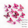 A collection of pink and magenta 3D butterfly wall stickers in various sizes and quantities.