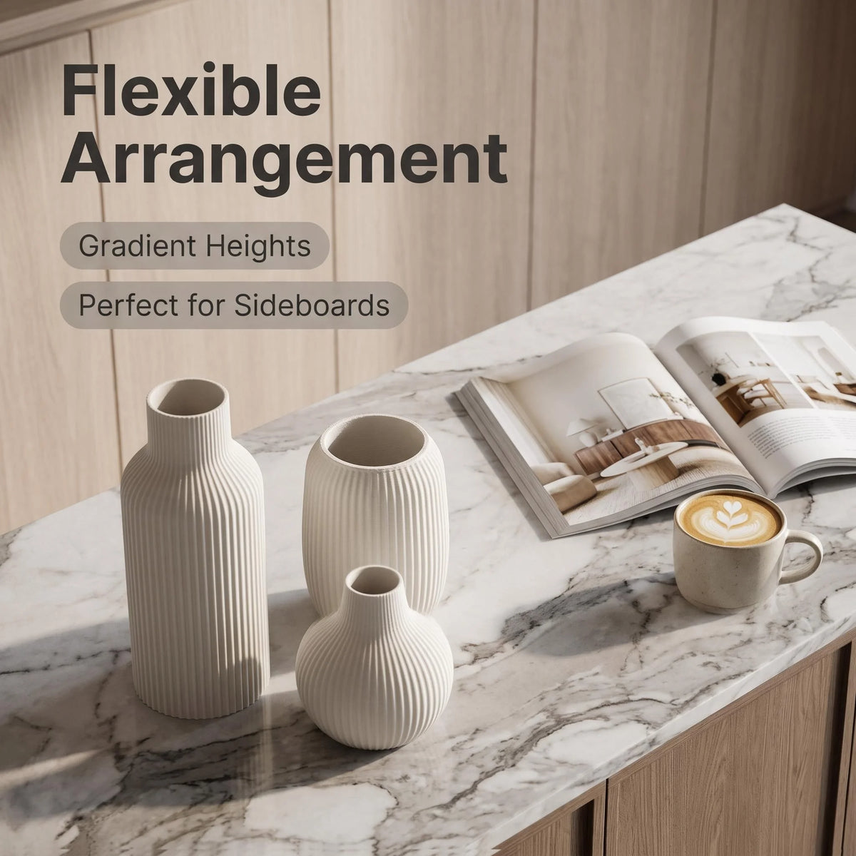 A set of three matte ceramic vases with vertical ribbed texture displayed on a marble countertop.