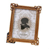 An elegant gold-framed photo frame featuring a vintage European design and white lace background.