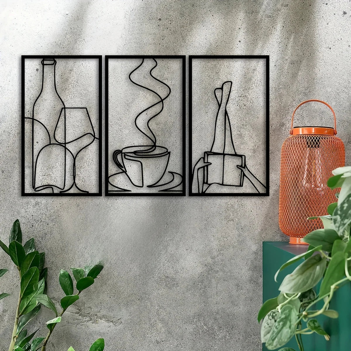 Three framed minimalist metal line art prints depicting a bottle, a cup of coffee, and a pencil.