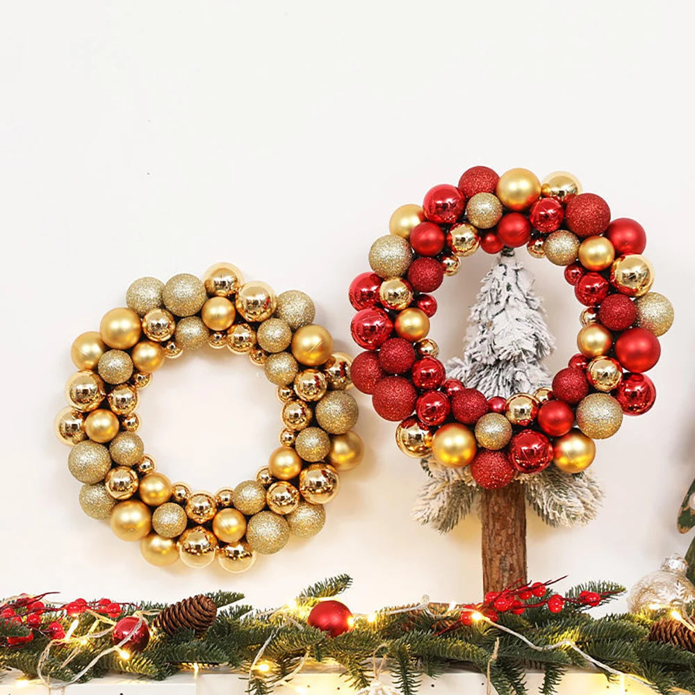 A golden and red silk Christmas ball wreath ornament decorated with glittery spherical balls.