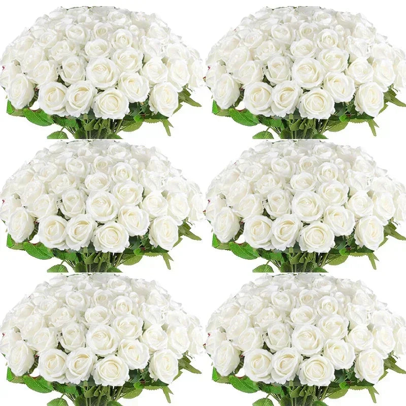 A cluster of white velvet artificial roses used for bouquets and home décor.