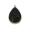A teardrop-shaped black natural agate pendant with a gold-colored bail.