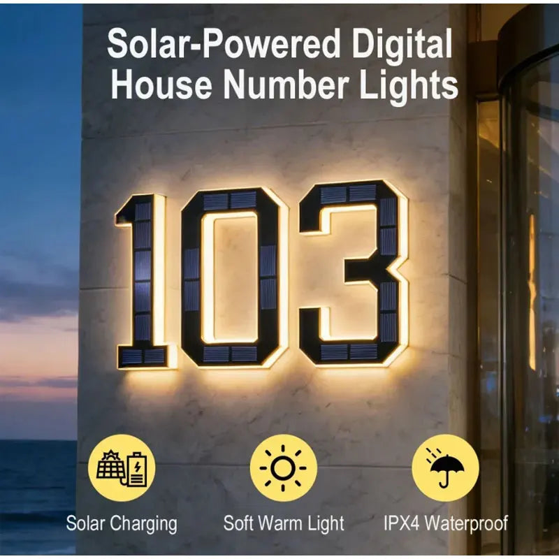 Primer plano de un letrero numérico digital solar que muestra el número 103 montado en una pared exterior.