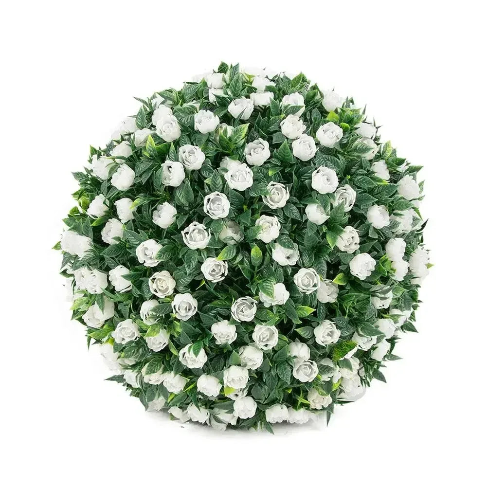 A dense sphere of artificial white roses and green foliage used as decorative floral arrangement