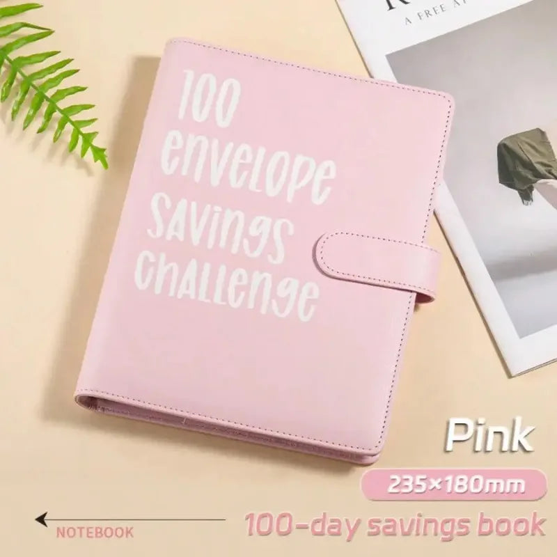 Pink leather envelope wallet for a 100-day savings challenge notebook