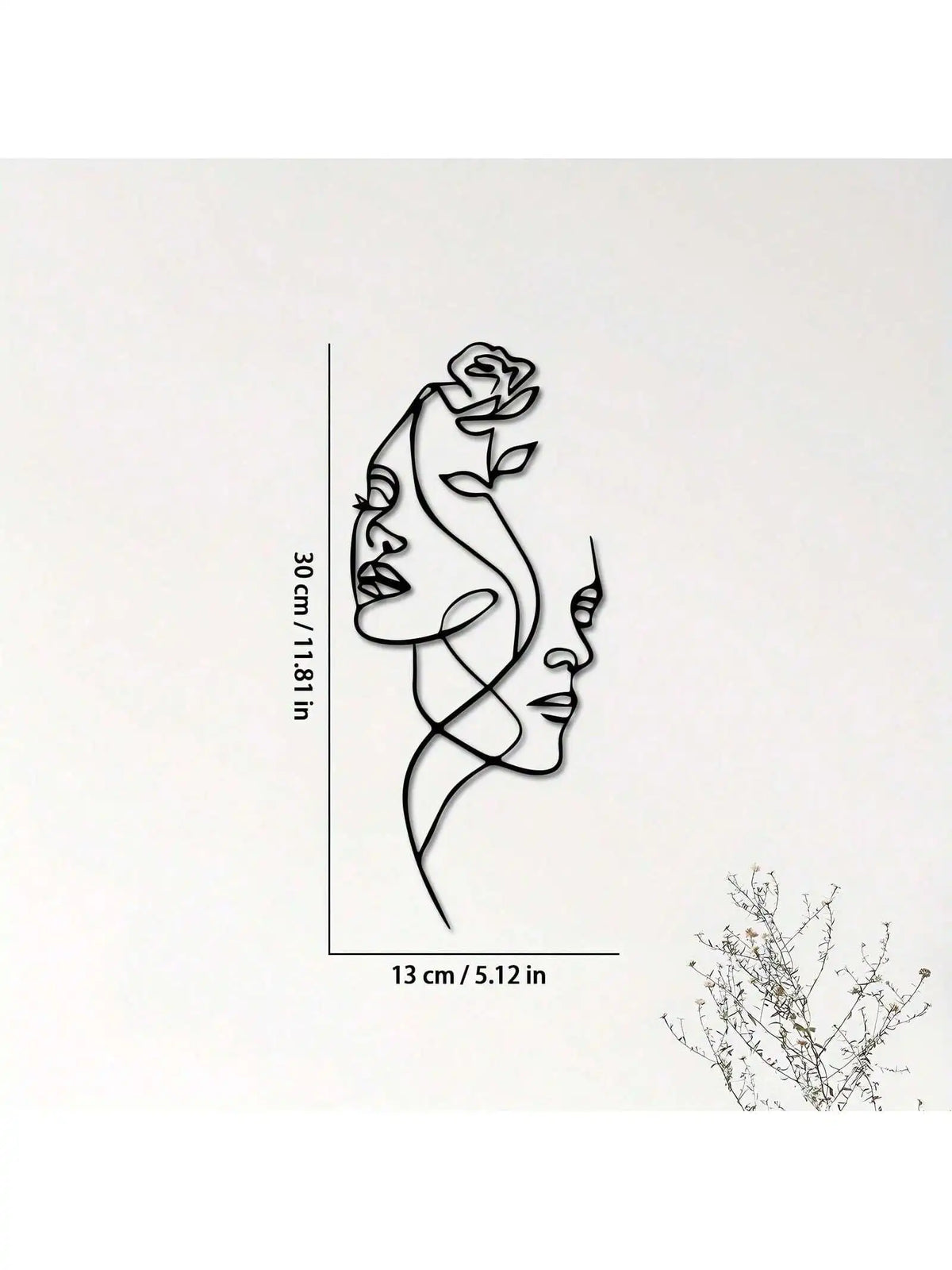 Black metal line art of a woman's profile, measuring 30 cm high.