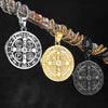 A stainless steel punk cross necklace featuring a detailed design suspended from a textured cord.