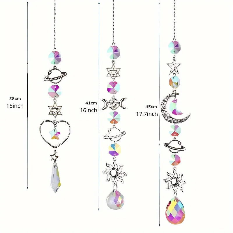 A set of crystal moon and sun wind chimes featuring various gemstone shapes and designs.