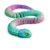 A vibrant green and purple 3D printed articulated snake fidget toy coiled on a white background.