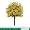 A dense, spherical arrangement of yellow artificial petunias on a black stake.