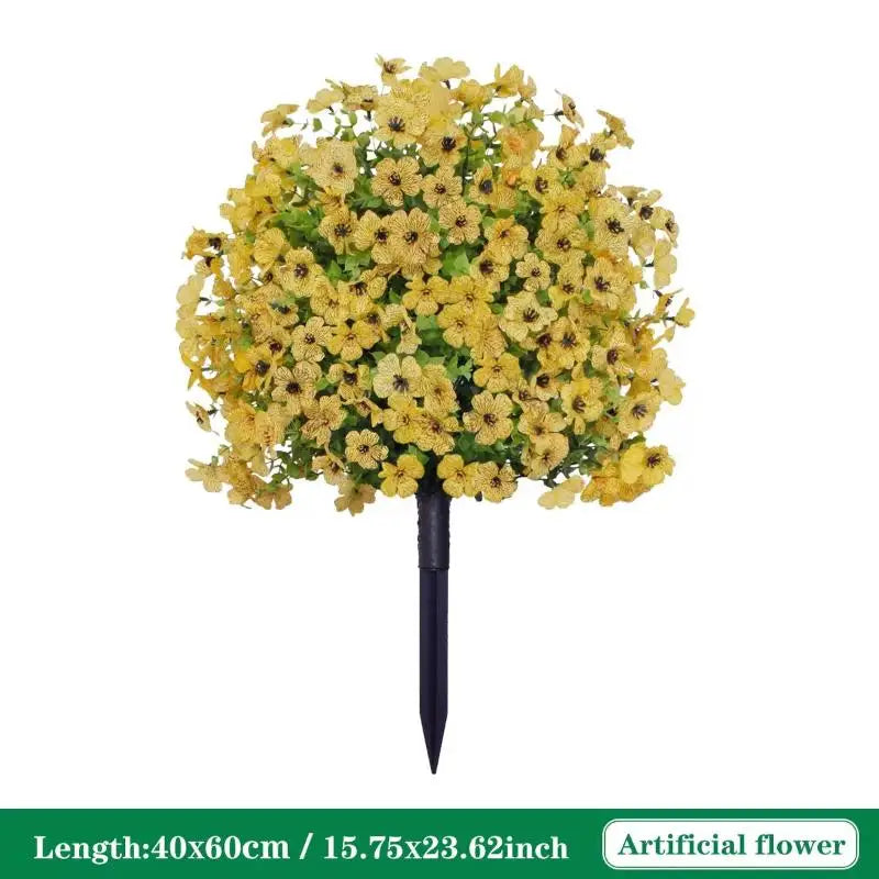 A dense, spherical arrangement of yellow artificial petunias on a black stake.