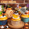 A collection of Halloween resin flatback charms featuring pumpkin and ghost embellishments on various cakes.