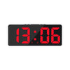 A black digital alarm clock displaying the time 13:06 with red LED digits.