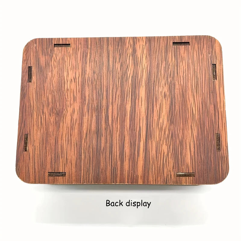 A close-up view of the back display of a wooden savings box with a progress tracker.