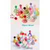 A collection of 30 mini colorful party hat cake toppers in various shapes and patterns.