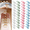 A set of 30 space-saving hanger connector hooks in various pastel colors, including white, light green, and pink.
