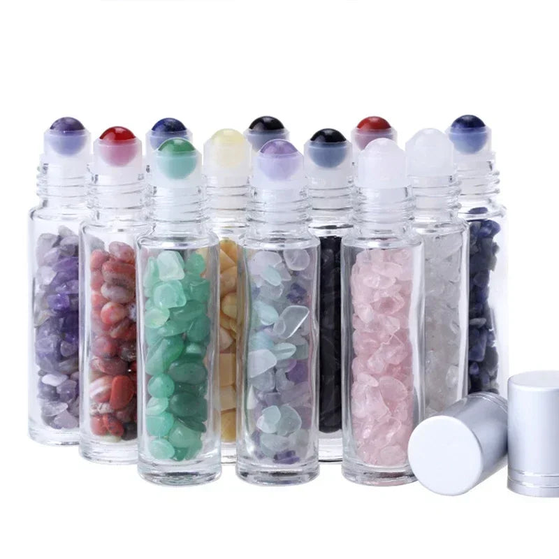 A set of ten glass roll-on bottles filled with various colored semi-precious stone roller balls.